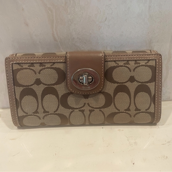 Coach Handbags - EUC Coach Monogram Turn Lock Wallet